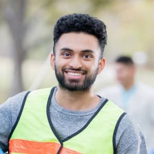 Volunteer in blue shirt