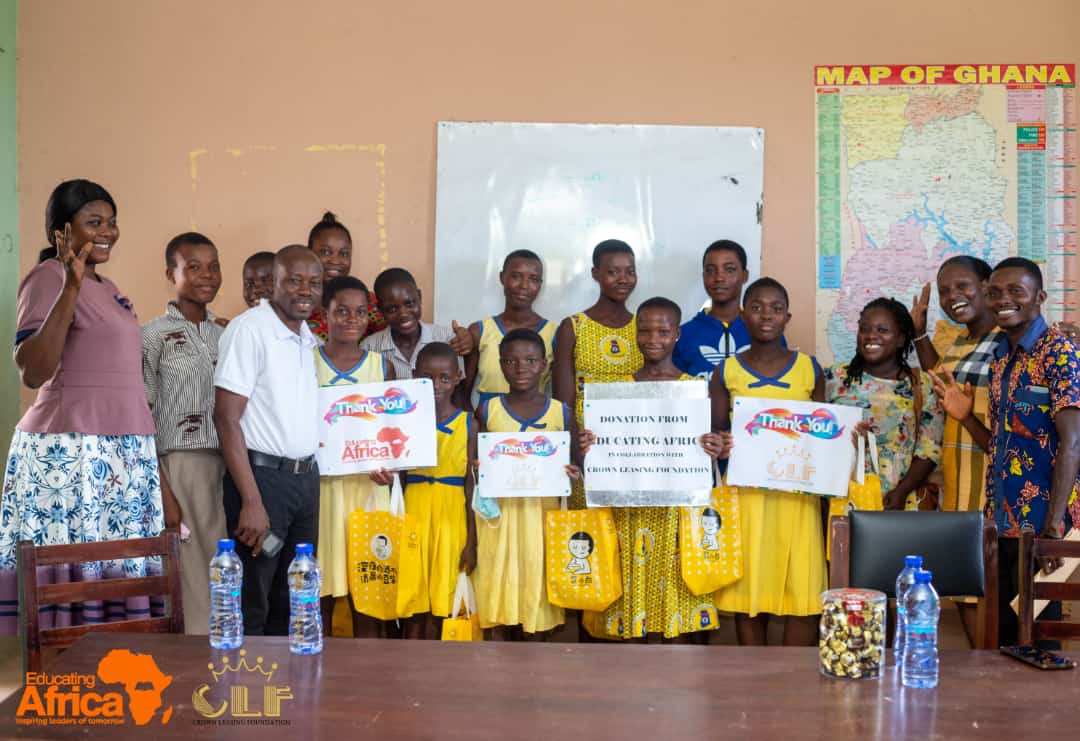 Delivering school uniforms to girls in Ghana